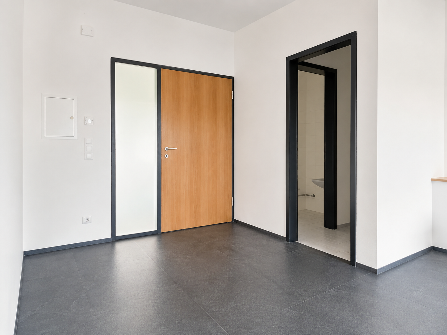 Eingangsbereich des Büros im Syncom-Gebäude in Brixen
